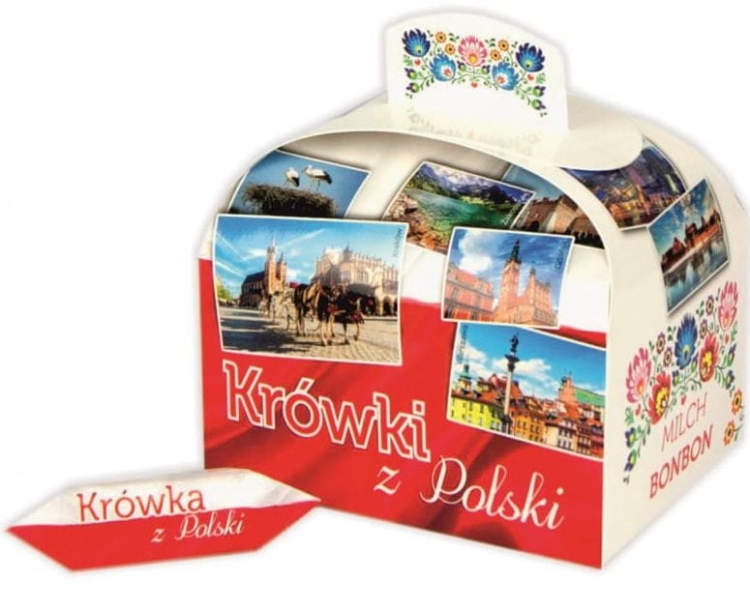 Słodki smak Polski w wyjątkowym wydaniu! Kuferek pełen śmietankowych krówek, ozdobiony ludowymi motywami łowickimi, to idealna pamiątka z podróży.
