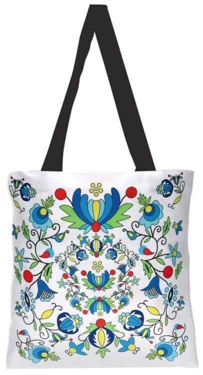 Biała torba z kaszubskim haftem, z długim uchwytem – widoczny ludowy wzór w żywych kolorach