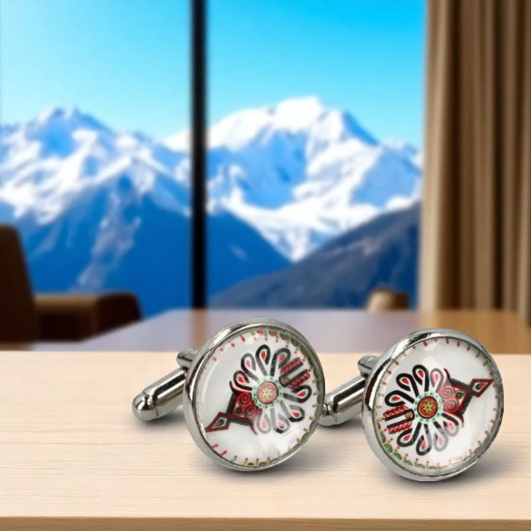 Ręcznie wykonane spinki do mankietów z wzorem parzenicy, symbol góralskiej tradycji, w eleganckiej formie.