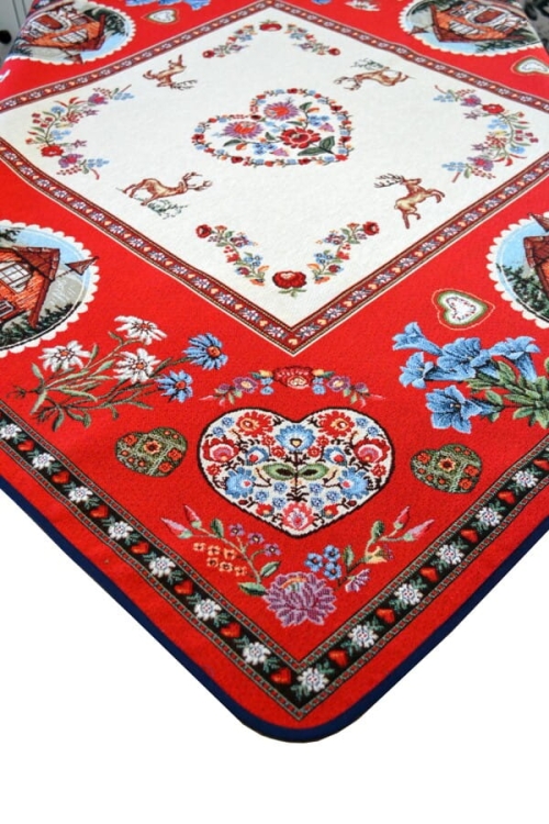 Obrus 100 x 100 cm z góralskim motywem – folkowe serca, kwiaty i zwierzęta.