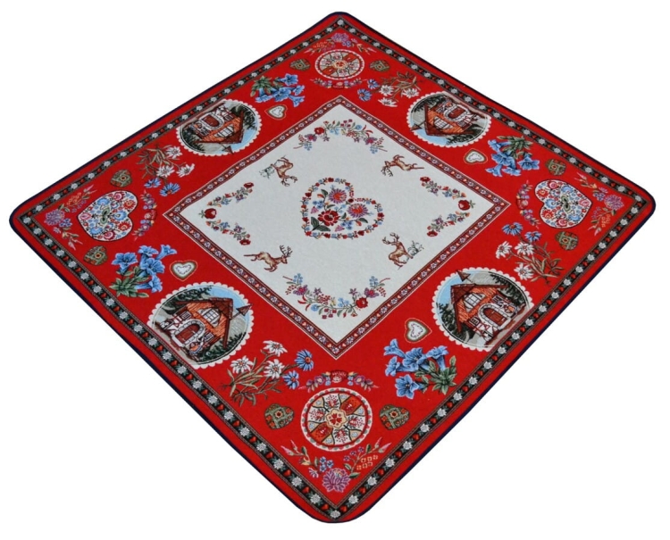 Kwadratowy obrus folk z gobelinu – klasyka tradycji w nowoczesnym wnętrzu.