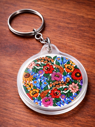 Okragly_breloczek_motywem_kwiatow_zalipianskich_kolorowy_wzor_ludowy_polska_produkcja.jpg