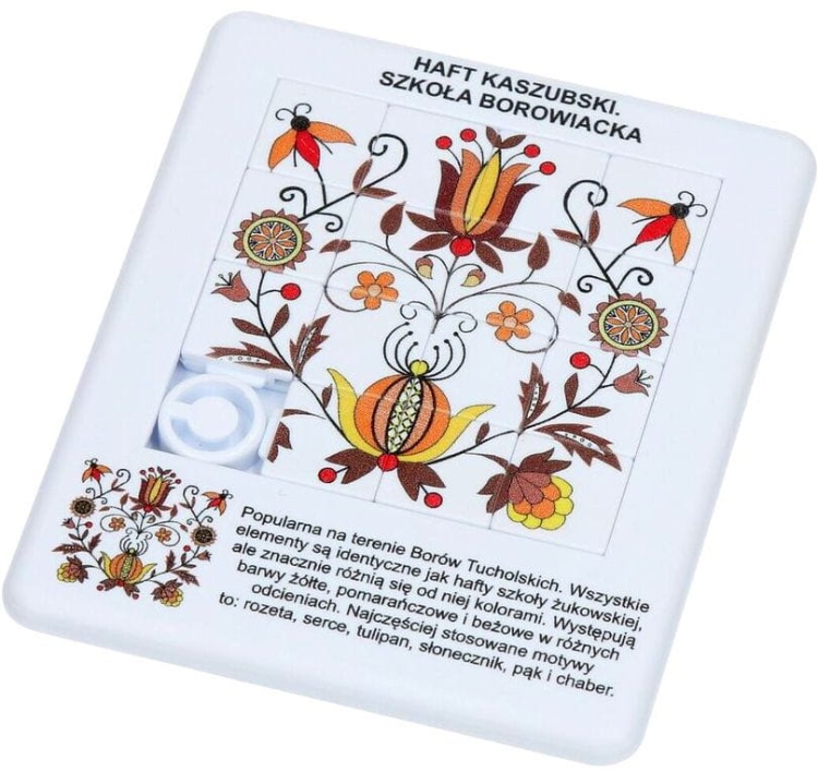 Puzzle edukacyjne z motywem haftu kaszubskiego szkoły borowiackiej – 15 prostokątnych kostek z barwnymi wzorami ludowymi.