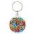 Okragly_breloczek_motywem_kwiatow_zalipianskich_kolorowy_wzor_ludowy_polska_produkcja